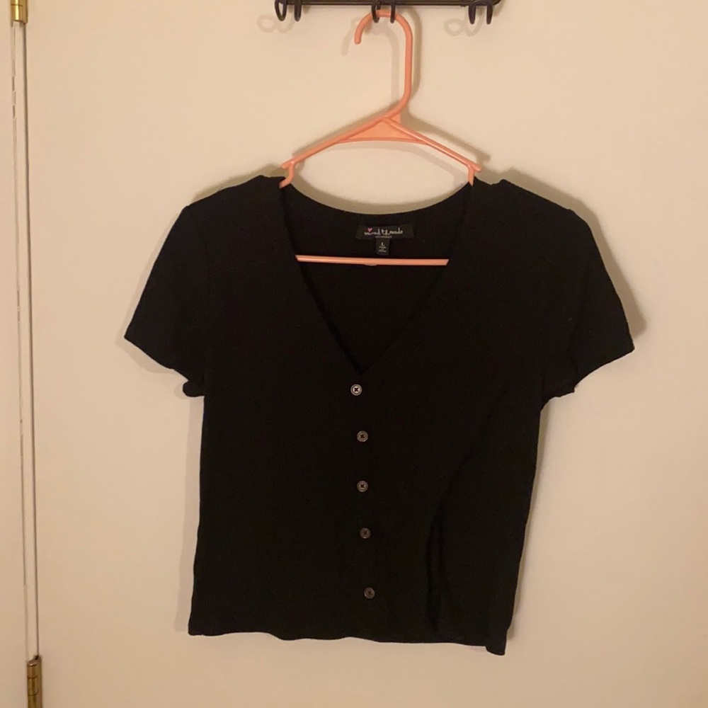 Cute and casual black top. NWOT